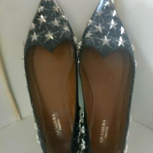 Aquazzura Leather cosmo star flats.